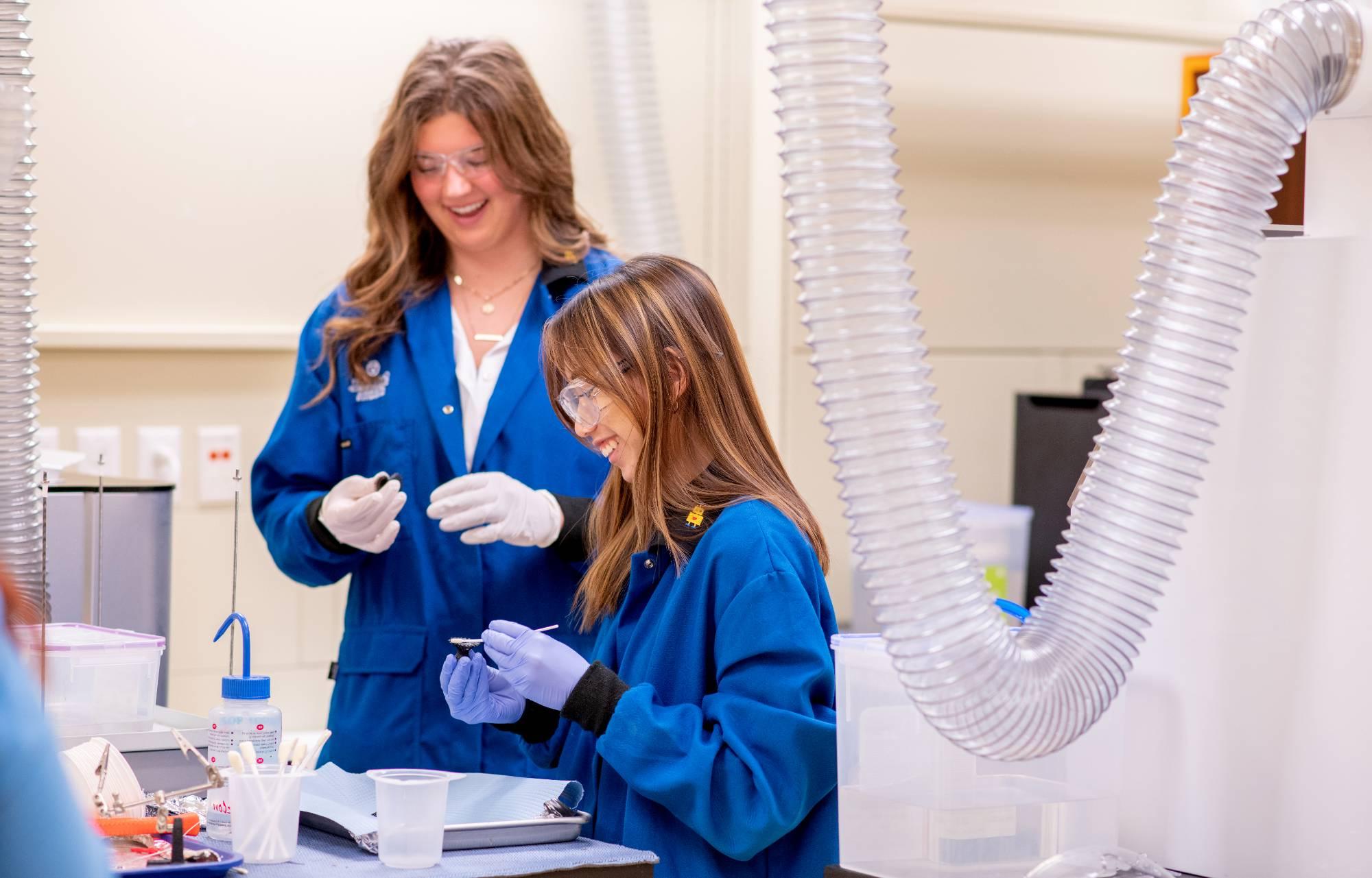 Co and Katie working in the 3D AM Lab